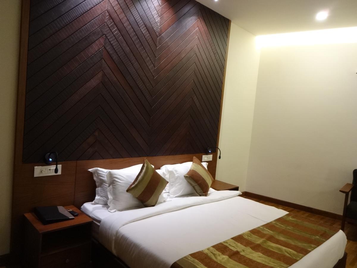 Woodies Bleisure Hotel Kozhikode Exterior photo
